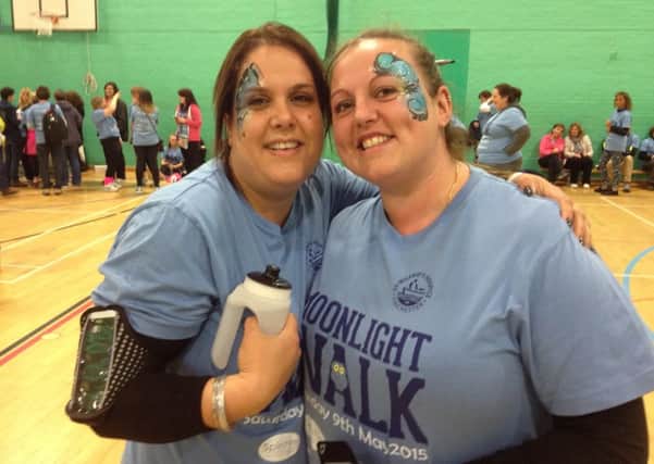 Claudia Smith and Caz Martin prepare for the St Wilfrid's Hospice Moonlight Walk