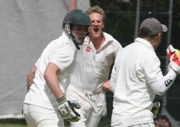 Chichester celebrate a wicket at Haywards Heath  Picture by Derek Martin