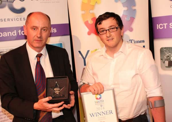 Sam Hedger winner of Courage Award at  County Times Youth Awards with Peter Woodman headteacher of the Weald School, Billingshurst (photo submitted/by Josh Smith). SUS-150220-112842001