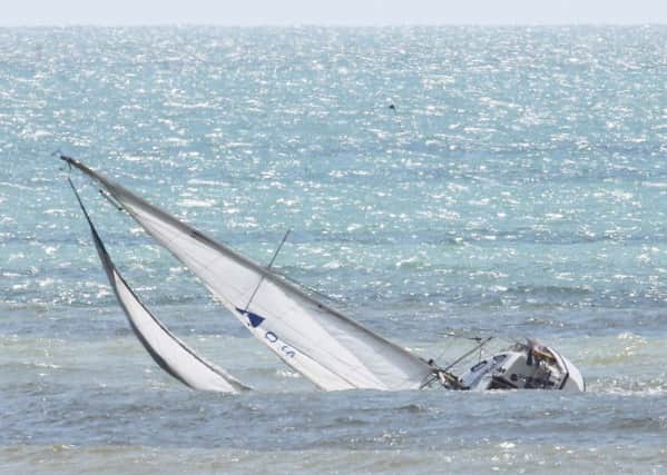 An operation is taking place to recover a yacht which sank off the coast of Littlehampton PHOTO: Eddie Mitchell