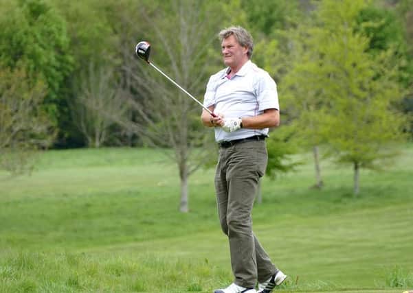Glenn Hoddle takes part in the fundraiser at Goodwood