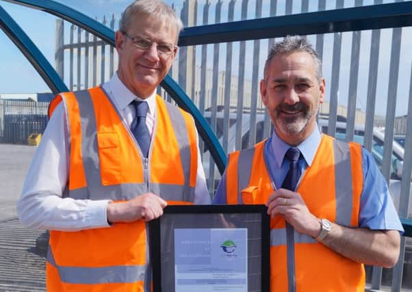 Peter Davies, left, with Paul Johnson holding the new eco-award plaque for Shoreham Port SUS-150518-144407001