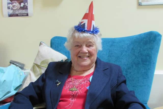 Audrey Stevenson enjoying the VE Day celebrations at St Michael's Hospice SUS-150519-122007001