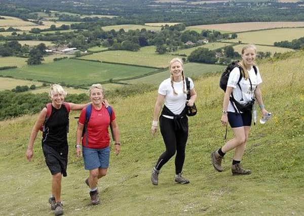 A TEAM of walkers who strode 100km along the South Downs Way in just under 23 hours are celebrating raising £2,300 for Oxfam and the Gurkha Welfare Trust.
Nicola Williams, of Park Lane, Eastbourne, joined Annette Feakes, Sarah Hatherly and Tracy Owen, in a team called the Decade Dames, to complete the Trailwalker Challenge in July.
They had to walk the 100km in less than 30 hours but finished in 22 hours 40 minutes, coming fifth in the ladies teams, and beating their fundraising taget of £1,500. Of the 540 teams who began the challenge, only just after half were able to cross the finishing line.
The team wished to thank their support crew who kept them supplied and encouraged and rewarded them with a bottle of champagne at the end. Their next challenge will be next May when they tackle the Yorkshire Moors for Oxfam fundraiser Trailtrekker. ENGPPP00720130406151036