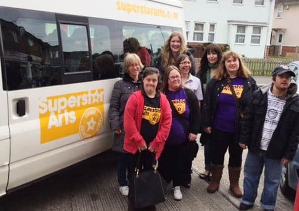 Superstar Arts celebrates the purchase of the new minibus from Worthing Mencap