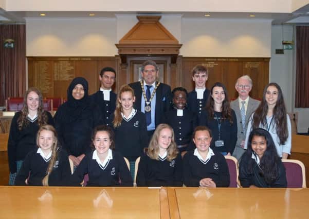 Twinning Association Schools Competition presentations. Thecompetitors with The Chairman of the HDC Brian O'Connell andChairman of the Horsham Twinning Association Oliver Farley. Photo by Derek Martin SUS-150514-211924008