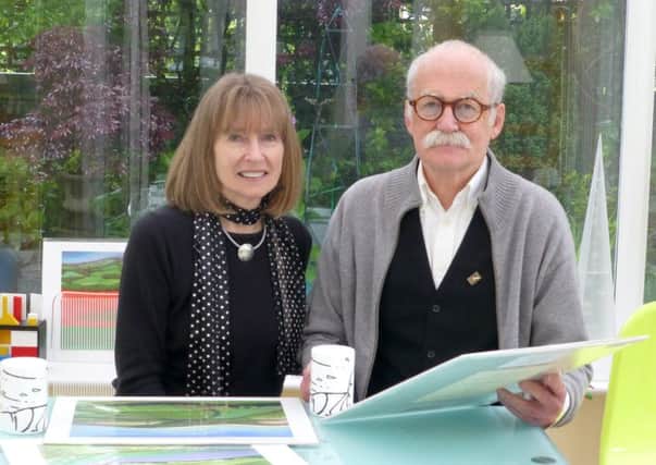 Illustrators Carol and Chris McEwan from Newick have their work on display in a joint exhibition in Rottingdean. Carol was asked by Marks and Spencer to create a tin to celebrate the birth of Princess Charlotte - picture submitted