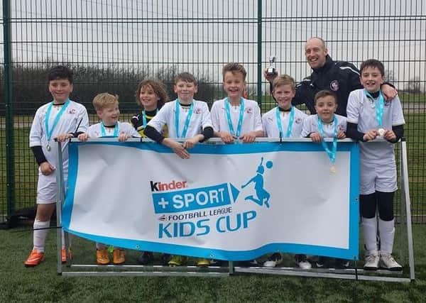 The Oaks Primary School U11s represented Crawley Town FC in the Southern Kinder Cup. SUS-150324-123502002