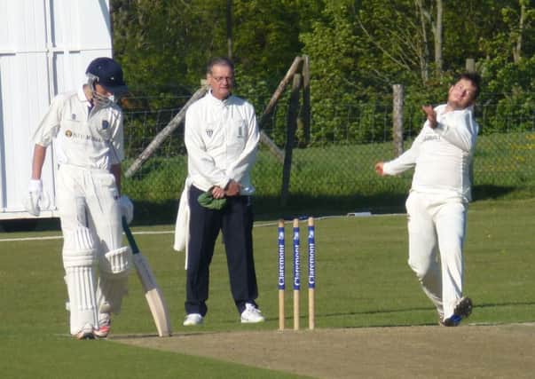 Dale Payne bowling for Crowhurst Park Cricket Club against Hellingly on Sunday. Picture by Simon Newstead (SUS-150517-233336002)