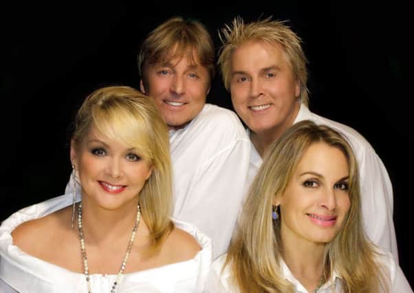 Cheryl, Mike and Jay, formerly of Bucks Fizz, with Bobby McVay