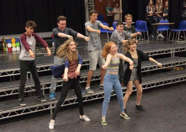 Steyning Grammar School students rehearse for their summer production SUS-150521-162054001