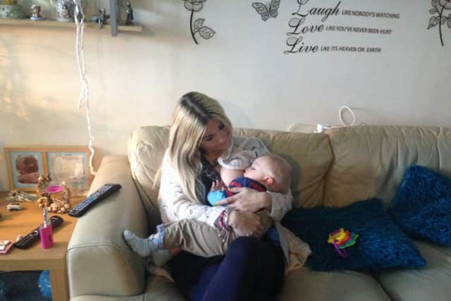 Lisa Bailey breastfeeding her son KJ
