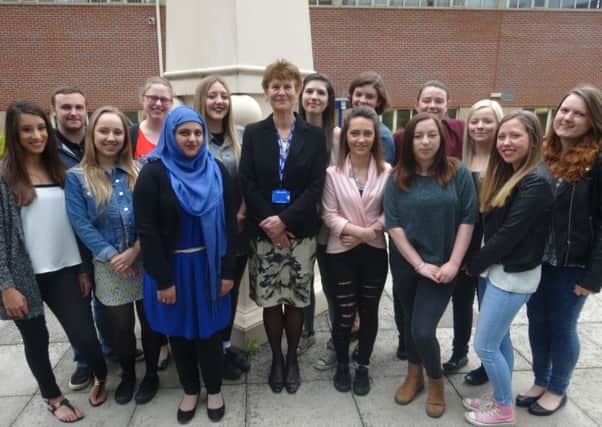 Principal Sally Bromley (centre) with successful level 3 EYE students SUS-150522-115510001