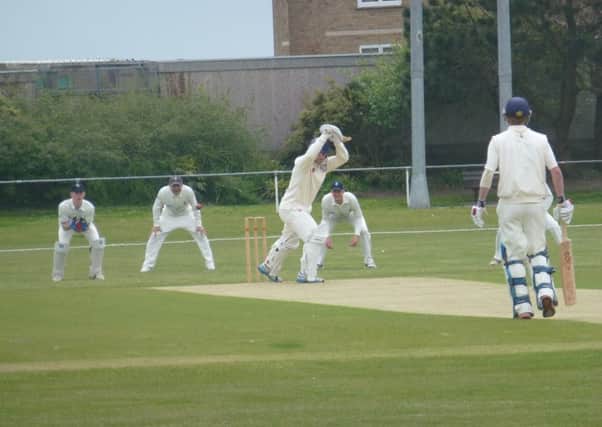 Malcolm Johnson watches a Chris Liddle delivery go by on his way to a half-century during Bexhill's victory at home to Billingshurst. Picture by Simon Newstead (SUS-150523-221549002)