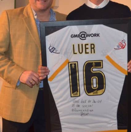 Greg Luer, with the Hull shirt he presented to the club, with manager Ian Chapman