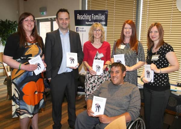 Project manager Brian O'Hagan, second left, at the launch of the Reaching Families guide dm1501605a SUS-151205-132849008