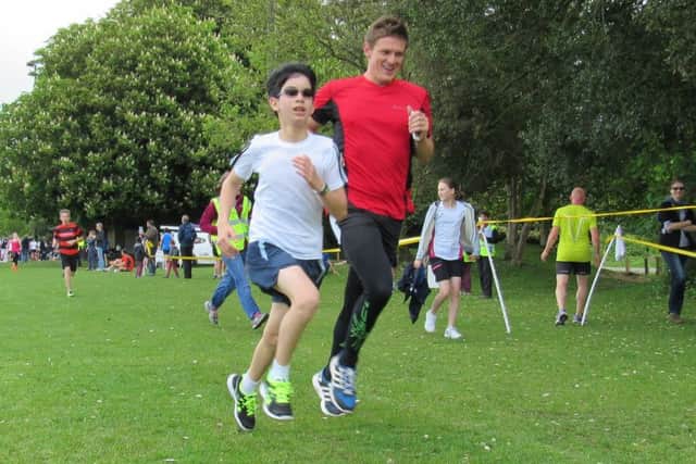 Thomas from year eight beating Chichester Free Schools PE teacher into second place