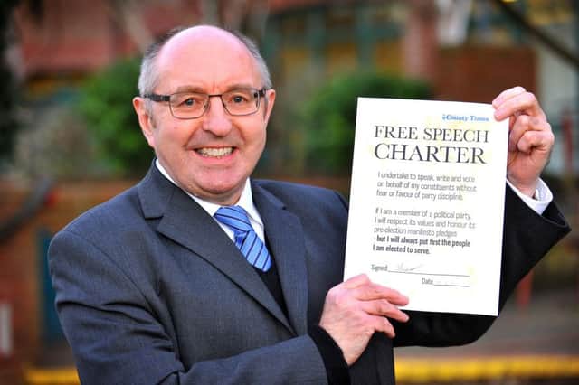 Andrew Baldwin outside the Horsham District Council offices with the Free Speech Charter. Pic Steve Robards SUS-150218-092638001