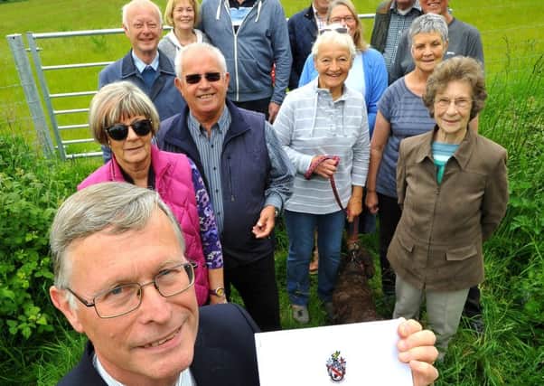 Nigel Stevens (parish councillor) and residents around the land south of New Hall Lane and west of Henfield Road in Small Dole are delighted that a proposal for 60 new homes has bnen refused. SR1511335. Pic Steve Robards SUS-150526-153124001
