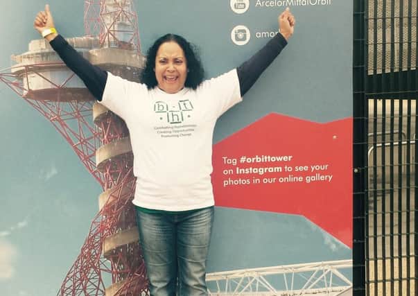 No fear! Gail Lalljee after abseiling down the London Orbit SUS-150527-134354001