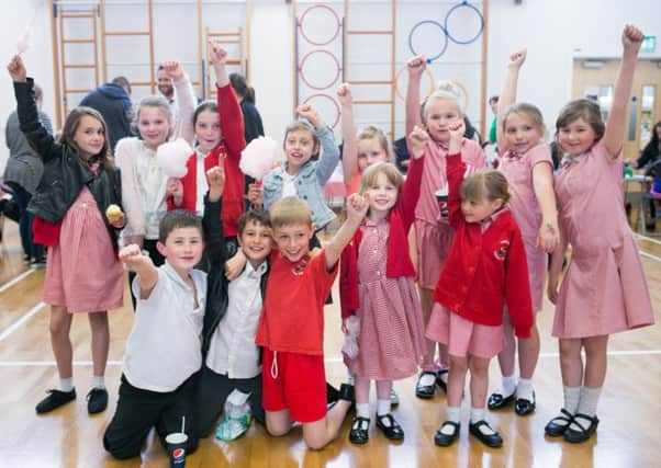 Pupils celebrate the amazing fundraising fête