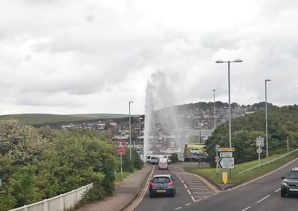 Burst water pipe in Newhaven. Photo by James Streeter. SUS-150529-101517001