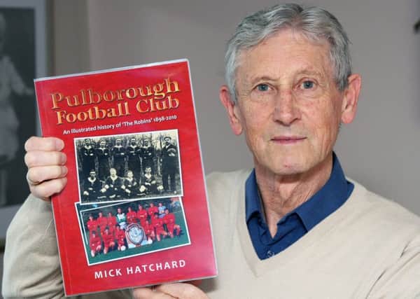 Mick Hatchard and his book The History of Pulborough FC. Photo by Derek Martin SUS-150514-212000008