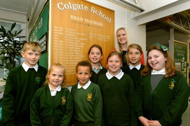 Headteacher Kate Powell and members of the student council look forward to the 100th and 150th anniversary celebrations at Colgate Primary School. SR1512278. Pic Steve Robards SUS-150206-155245001