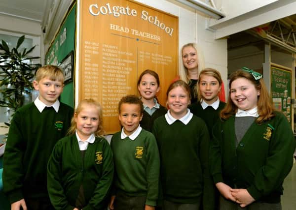Headteacher Kate Powell and members of the student council look forward to the 100th and 150th anniversary celebrations at Colgate Primary School. SR1512278. Pic Steve Robards SUS-150206-155245001