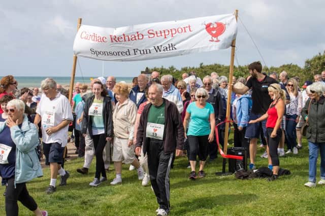 More than 100 people took part in last year's sponsored walk Picture by Peter R Hawkes SUS-140307-085400001