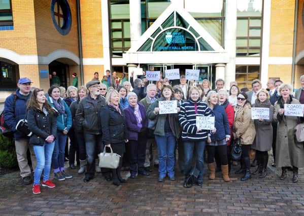 Residents outside County Hall North in Horsham in March before WSCC's planning committee threw out Crouchland Farm's retrospective planning application