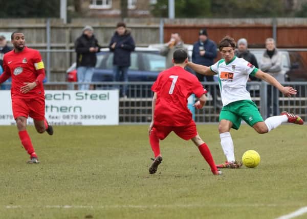 Craig Robson in action against Harrow / Picture by Tim Hale
