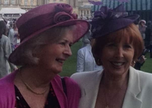 Marjorie Graham (L)  Margaret Smith (R) at Buckingham Palace Garden Party on May 20th to collect the Snak Shak's Queen's Award SUS-150306-122340001