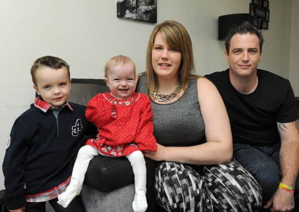 Parents Dan Sapio and Cara Hunter with their children Harvey, four, and Grace, who passed away three months before her second birthday.  Picture: Paul Jacobs