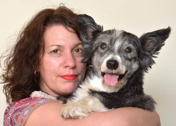 Nikki Blight with her dog Alfie, who is recovering from an Adder snake bite.SC030615012 SUS-150406-090104001