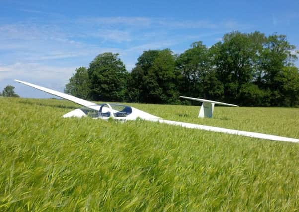 Glider lands in Storrington cornfield - Photo by Phil Lucas SUS-150406-124608001
