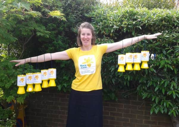 Charity Marie Curie are searching for volunteer collection box coordinator in Horsham SUS-150506-143824001