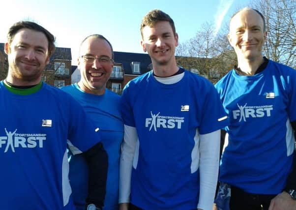James Pennicott (left), Nick Casburn (second from right) and Neil McAlpine (right) were part of the Running for Neil team