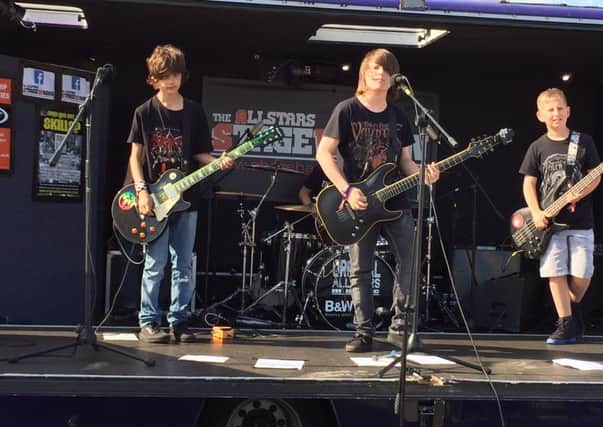 Some of Shoreham Allstars taking to the stage during the Wild Life Festival SUS-150706-190109001