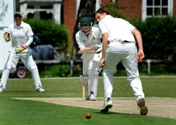 Burgess Hill CC (batting) v Chichester Priory Park. Tom Trowbridge with the bat, Dan Weigl, bowling. Pic SR1512795. Pic Steve Robards SUS-150806-124528001