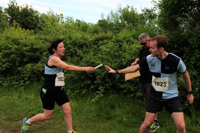 Cath Beckett hands over to Neil Grigg at the SDWR (courtesy -  Caz Wadey) Sks0_v8LaFT1bw3ihpUp
