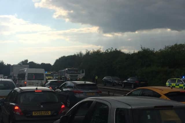 Traffic at a standstill as emergency services attend a crash on the A27 which has closed the Chichester bypass SUS-150806-172648001