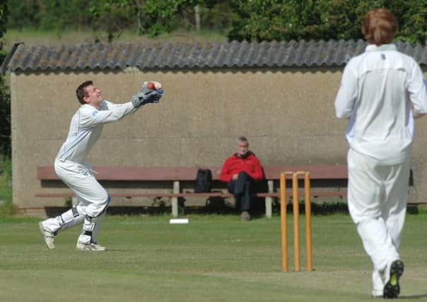 Southwater CC V Stirlands - Southwaters WK takes a wicket (Pic by Jon Rigby) SUS-150906-095035008