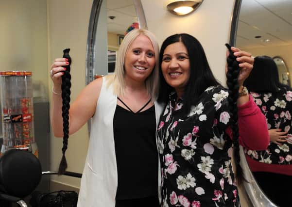 Vidya Gobar has her hair cut off for Little Princess Trust (Pic by Jon Rigby) SUS-150906-124754008