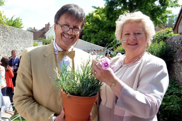 Tim Wonnacott the Patron of the Chichester Festival of Flowers 2016 with the Chairman, Hilary Tupper, and the new Pink, especially cultivated for the festival..ks150018-1 SUS-150906-203201008