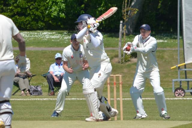 Bexhill wicketkeeper Cameron Burgon gathers the ball during last weekend's defeat at home to Preston Nomads. Picture by Stephen Curtis (SUS-150706-172529002)