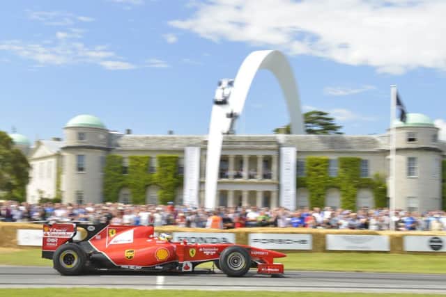 Pedro de la Rosa driving a Ferrari at the 2014 Festival of Speed