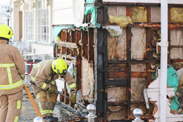 Firefighters tackling the blaze at Worthing Pier SUS-150613-230619001