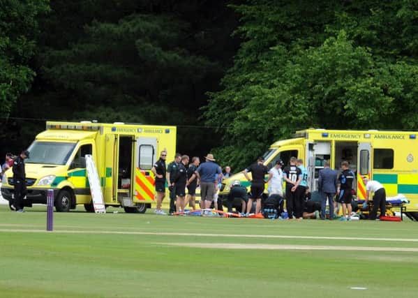 Henriques and Burns are treated on the pitch