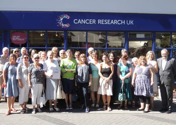 Volunteers outside Horsham's Cancer Research UK shop.